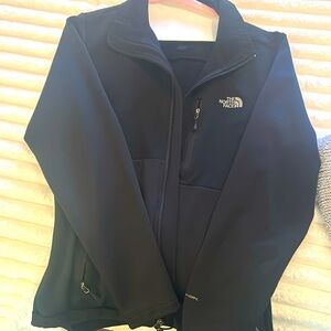 The north face lightweight black soft jacket. No hood. Size M